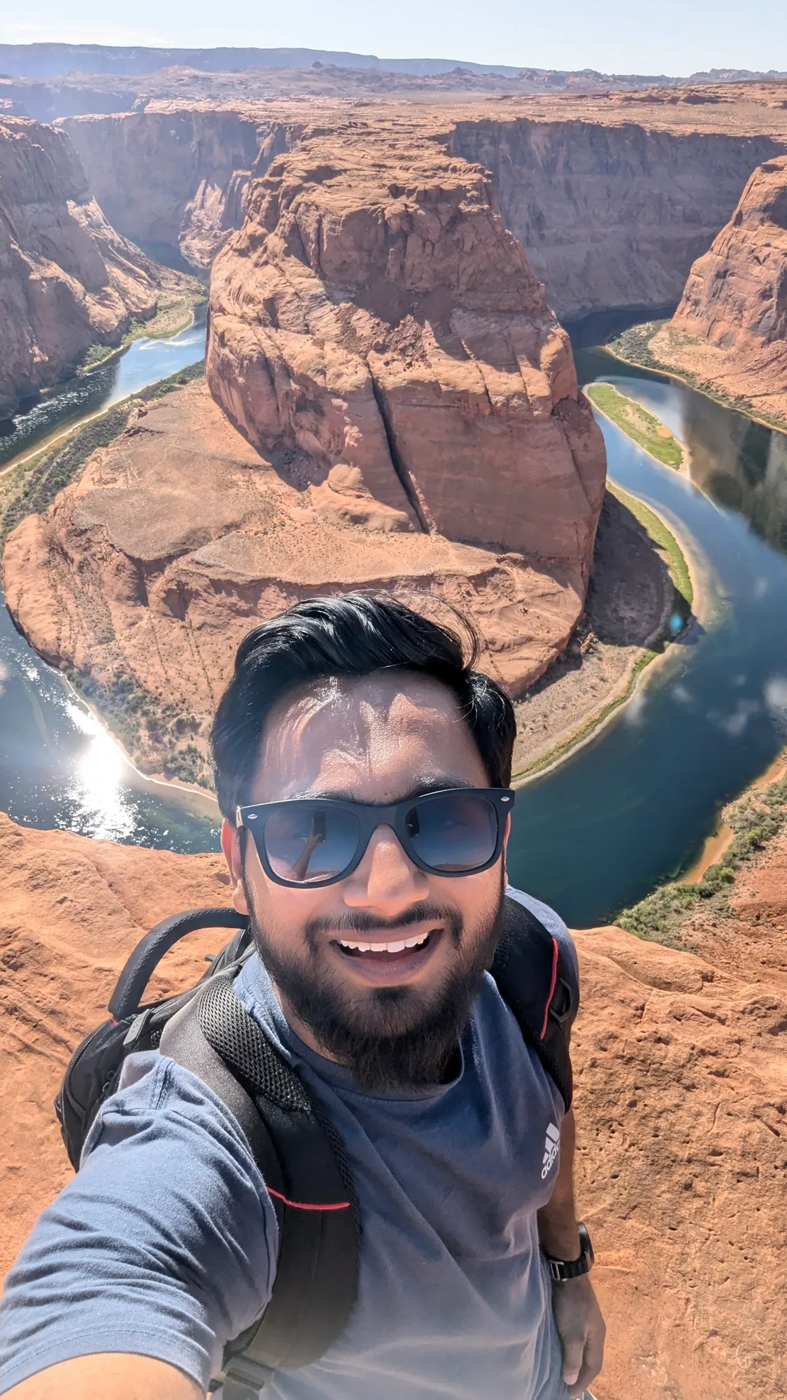 Varun Singh at Horseshoe Bend with the Colorado River below