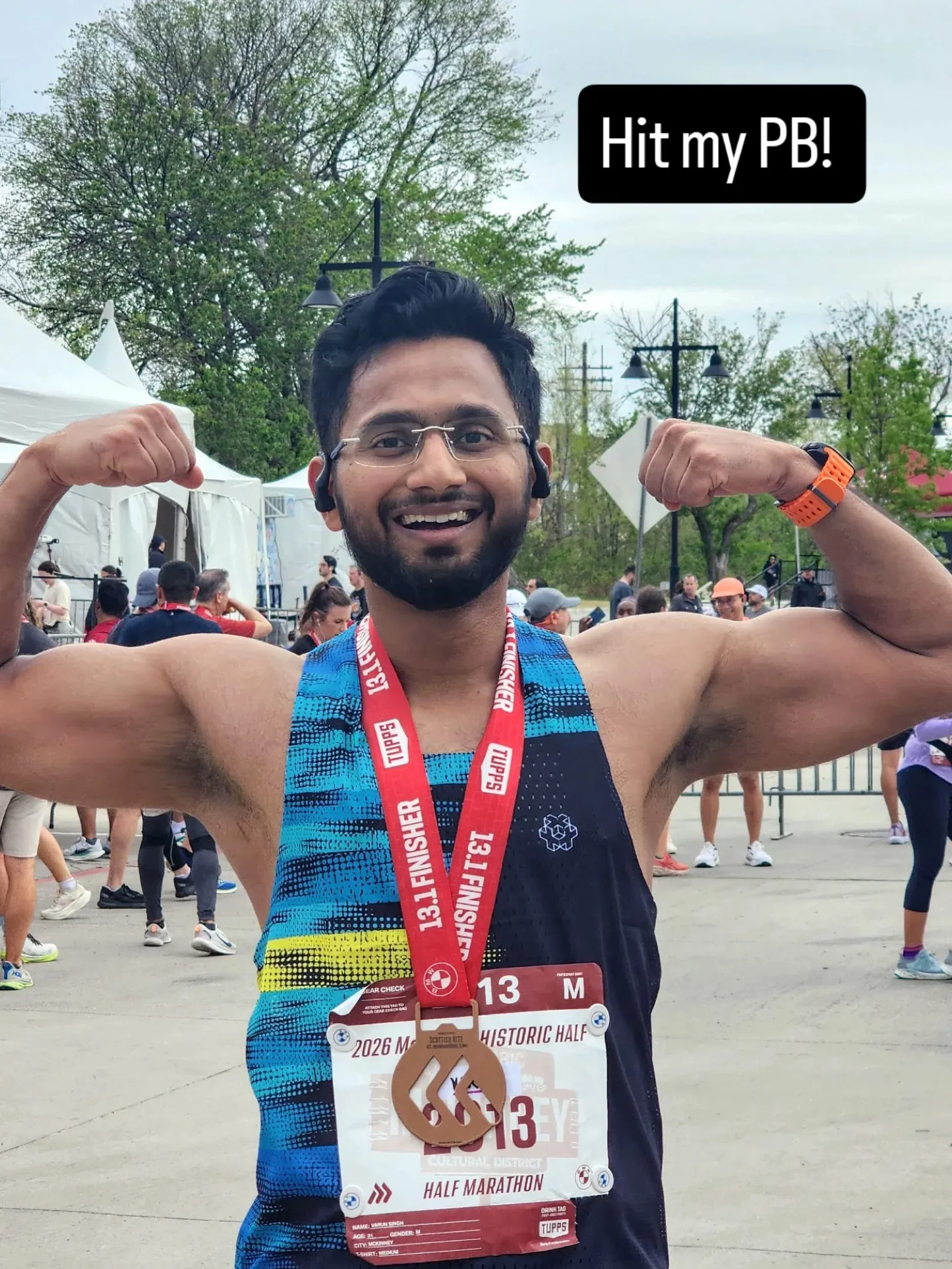 Varun Singh with a half marathon finisher medal